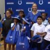 Indianapolis Colts surprise 500 Pike Township students with new uniforms, school supplies and more